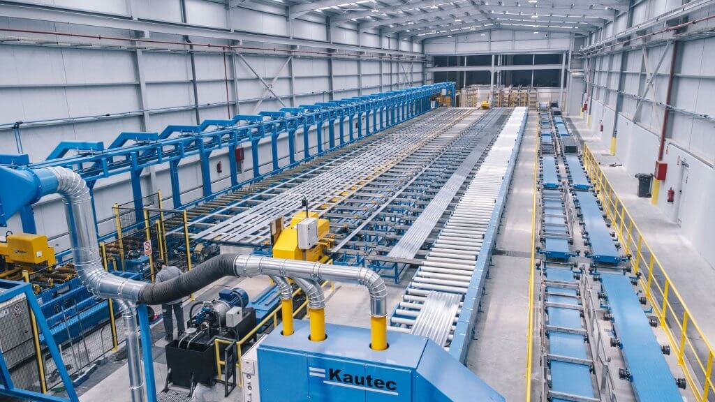 Industrial aluminum extrusion press machine working with high-efficiency hydraulic systems in an automated production line.